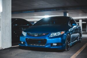 Blue car in a parking garage