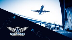 Image of plane flying over an interstate with the Fly 'n' Shine logo